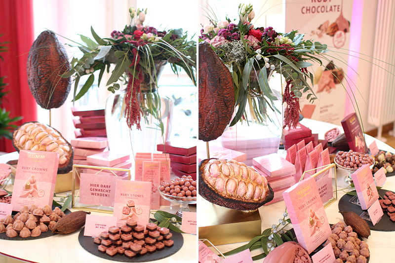 Ruby Chocolate Produkttisch Heilemann Ruby Chocolate arrangiert auf einem Produkttisch mit Dekoelementen