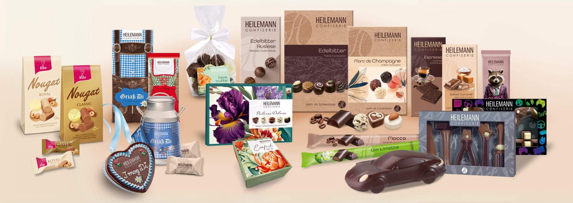 Produktsortiment von Viba und HEILEMANN mit Nougat, Pralinen, Schokolade, Figuren und Geschenken