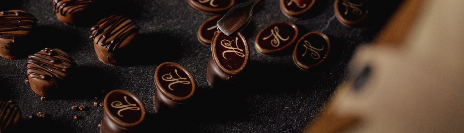 Confiserie HEILEMANN Pralinen mit HEILEMANN Logo